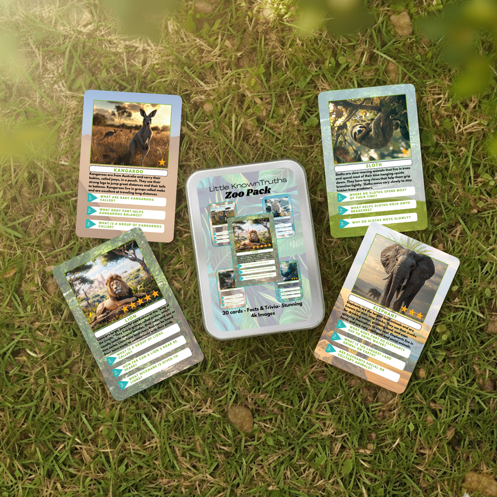 Set of zoo animal-themed trading cards on grass