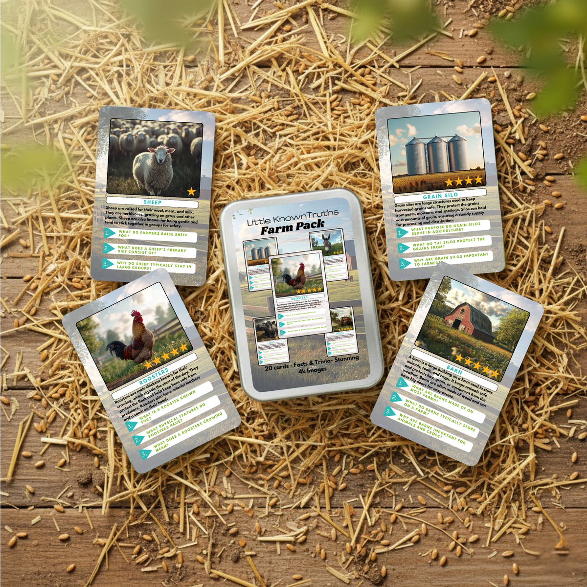 Set of cards on a wooden surface with straw, featuring farm animals and silos.