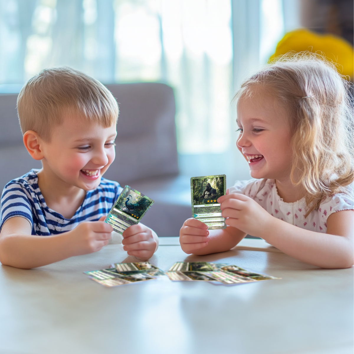 Two children playing with trading cards themed after zoo animals in a bright room.